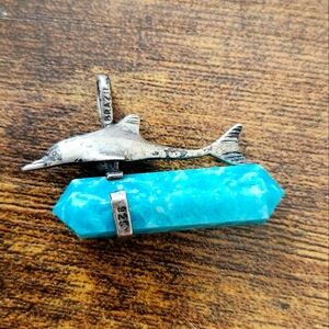 Silver dolphin with turquoise obelisk pendant